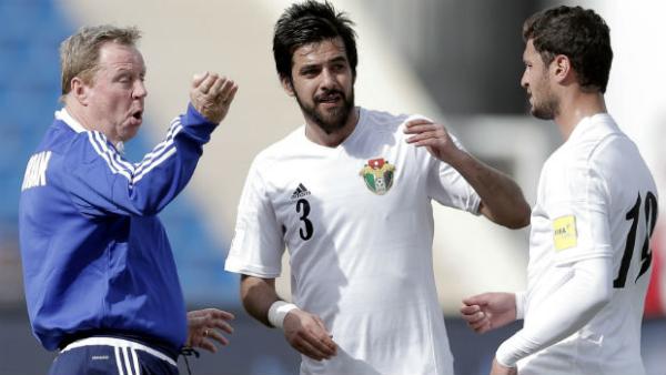 Manager Harry Redknapp gives instructions to his players during Jordan's win over Bangladesh.