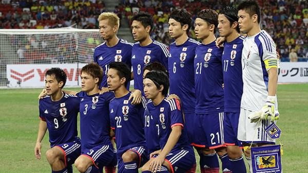 Japan pose for a team photo prior to their 4-0 loss to Brazil.