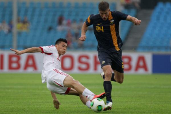 China deny Socceroos in goal fest