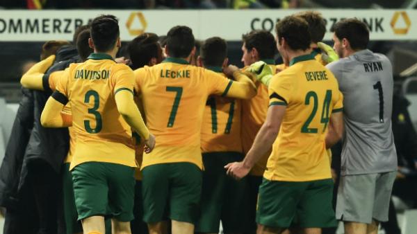 The Socceroos celebrate Mile Jedinak's goal against Germany.