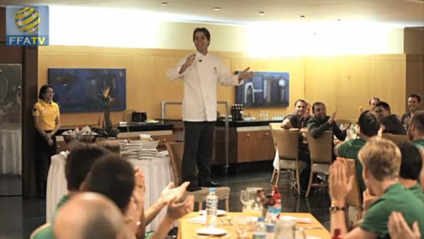 The Socceroos' chef in Brazil Vinicius Capovilla entertains the squad with a song.