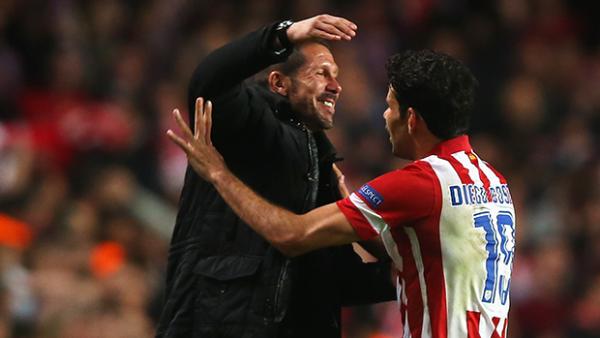 Coach Diego Simeone and striker Diego Costa celebrate during Atletico Madrid's Spanish title winning season.