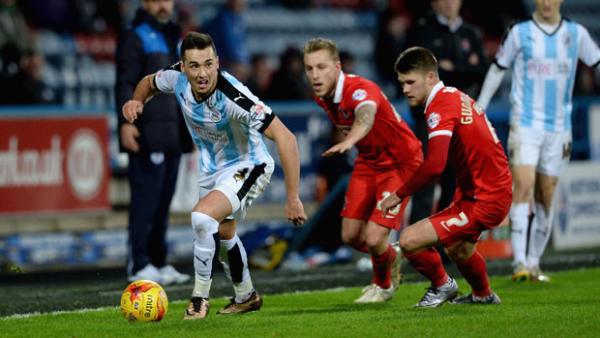 Caltex Socceroo left-back Jason Davidson has sealed a switch from the English Championship to the Eredivisie.