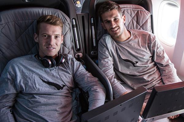 Socceroos Oliver Bozanic and Dario Vidosic enjoying the flight to Brazil.