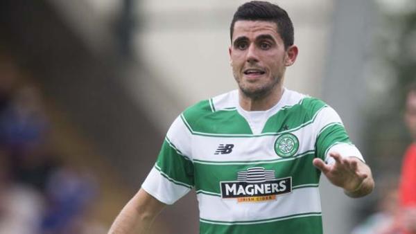 Tom Rogic scored the opener in Celtic's 2-0 win over Partick Thistle.