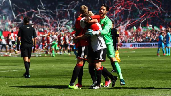 Brad Jones celebrates with his Feyenoord teammates after winning the Eredivisie title.