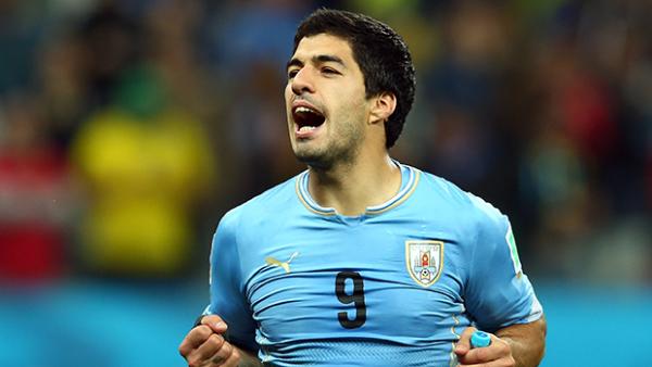 Suarez celebrates after scoring against England at the FIFA World Cup.
