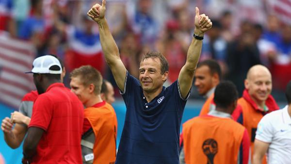 Klinsmann celebrates after the USA qualified for the round of 16.