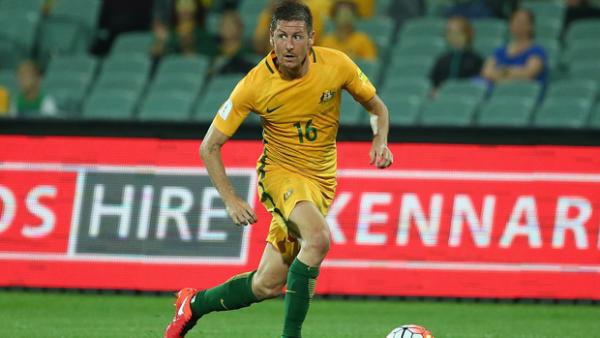 Nathan Burns on the ball for the Caltex Socceroos against Tajikistan.
