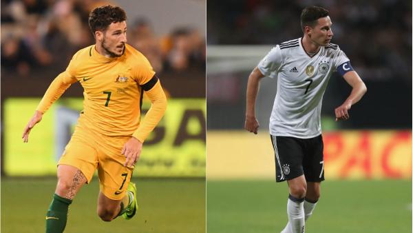 Caltex Socceroos flyer Mat Leckie and German captain Julian Draxler.