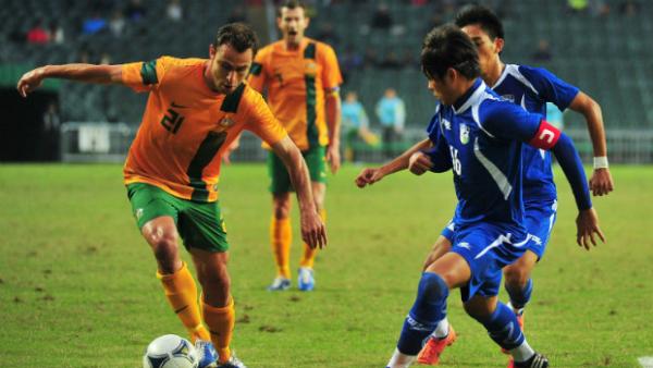 Richard Garcia on the ball for the Socceroos against Chinese Tapei in 2012.