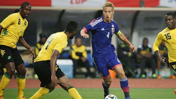 Japan's Keisuke Honda on the ball against Jamaica.
