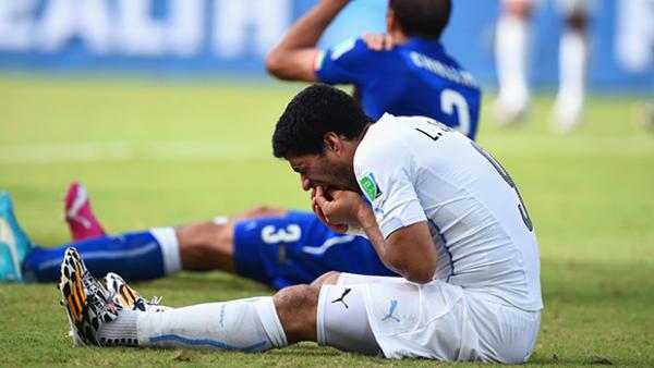 Suarez after his alleged bite on Italy's Giorgio Chiellini.