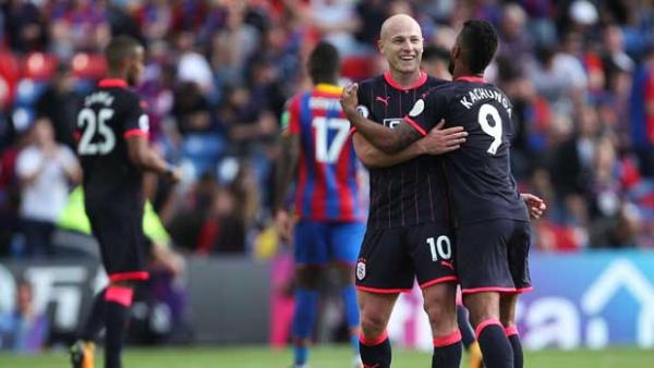 Aaron Mooy celebrates after Huddersfield Town's 3-0 win over Crystal Palace in the EPL opener.