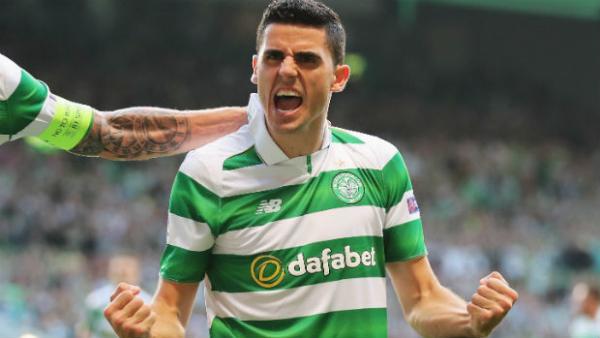 Tom Rogic celebrates scoring for Celtic.