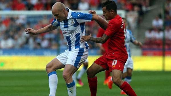 Aaron Mooy on the ball against Liverpool.