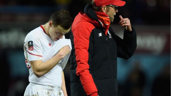 Brad Smith looks on following Liverpool's extra-time loss to West Ham.