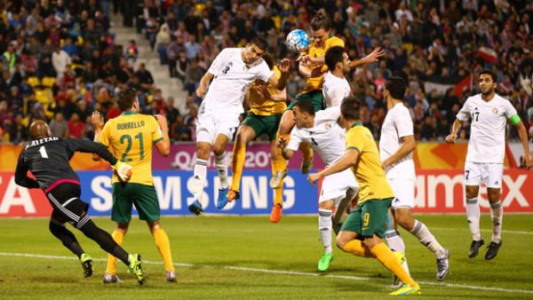 The Olyroos go close to scoring from a set piece against Jordan.