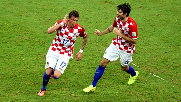 Croatia's Mario Mandzukic celebrates scoring his team's third goal against Cameroon.