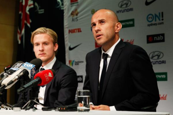 Mark Bresciano and Ben Halloran address the media before the Socceroos flew out for the World Cup.
