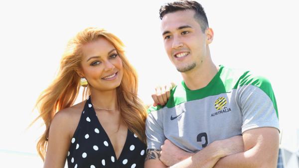 Havana Brown poses for a photo with Socceroo Jason Davidson.