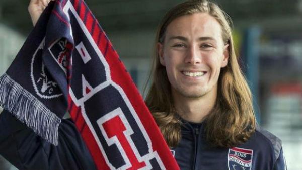 Olyroo Jackson Irvine shows his Ross County FC colours.