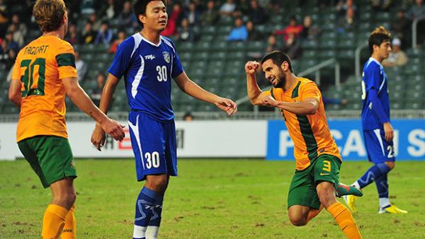 Socceroos defender Aziz Behich celebrates scoring against Chinese Tapei.
