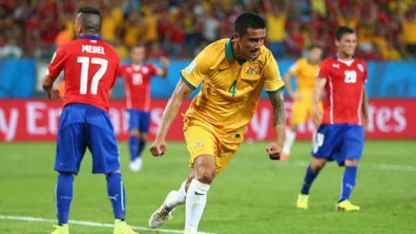 Socceroos striker Tim Cahill celebrates after scoring against Chile.