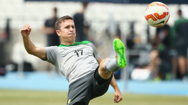 Matt McKay juggles the ball during a Socceroos Asian Cup training session.