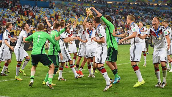 Germany parade the World Cup trophy around the Maracana Stadium.