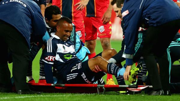 Archie Thompson is stretchered off AAMI Park after injuring his knee in the Westfield FFA Cup.