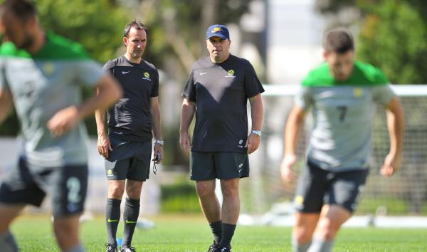 Socceroos coaching staff oversee training ahead of the Asian Cup.