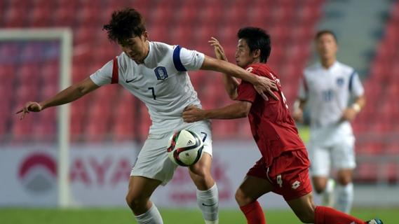 Son Heung-min holds up the ball for Korea Republic in their win over Myanmar.