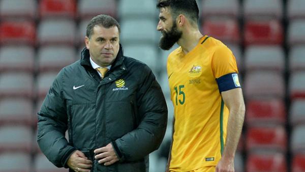 Caltex Socceroos boss Ange Postecoglou with skipper Mile Jedinak.