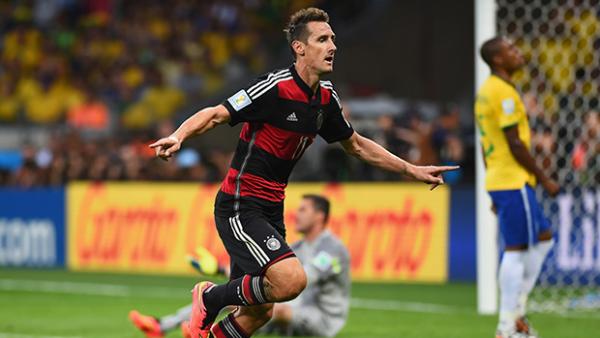 Germany's Miroslav Klose became the greatest scorer in World Cup history in win over Brazil.