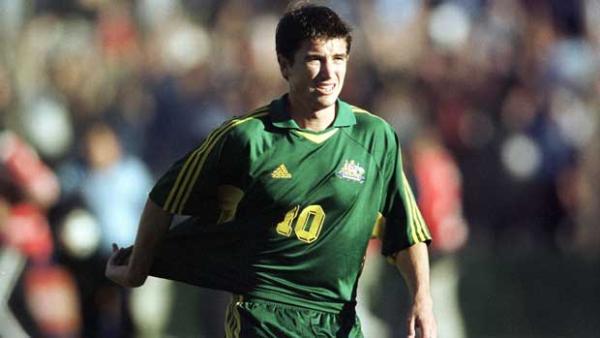 Harry Kewell trudges off the pitch after the loss to Uruguay in 2001.