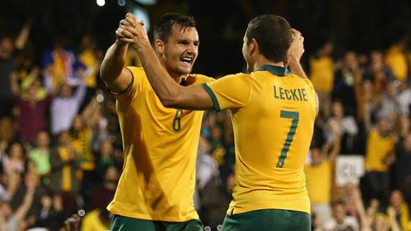 Bailey Wright celebrates after scoring on debut against Saudi Arabia.