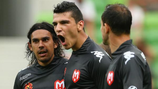 Eli Babalj celebrates scoring for former club Melbourne Heart.