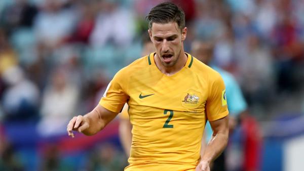 Milos Degenek on the ball during Australia's 3-2 loss to Germany.