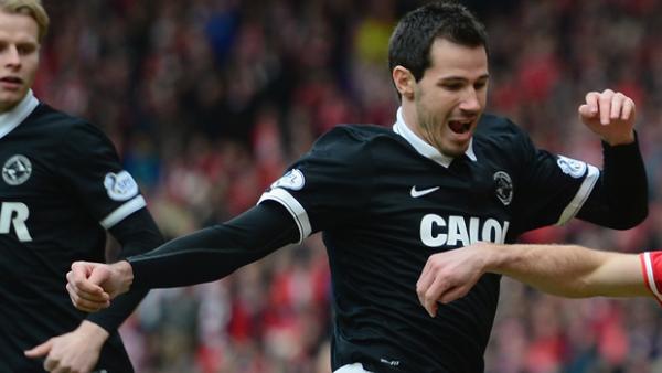 Ryan McGowan in action for Dundee United.