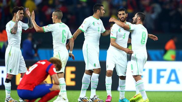 Algeria's players celebrate their resounding 4-2 win over Korea Republic.