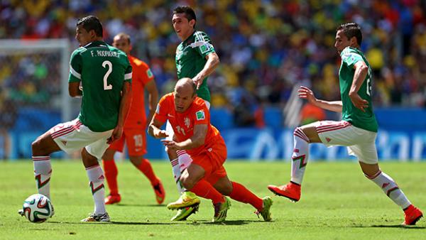 Arjen Robben takes a tumble during the Netherlands win over Mexico.