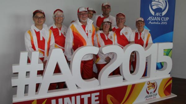 AFC Asian Cup volunteers model their new uniforms.