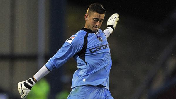 Cisak in action for Oldham Athletic against Manchester City in a pre-season friendly.