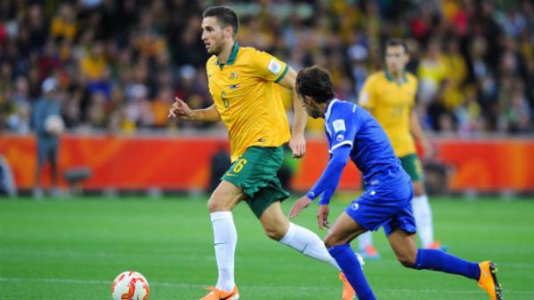 Defender Matthew Spiranovic on the ball against Kuwait.