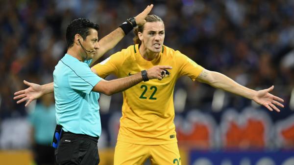 Midfielder Jackson Irvine in action against Japan in Saitama.