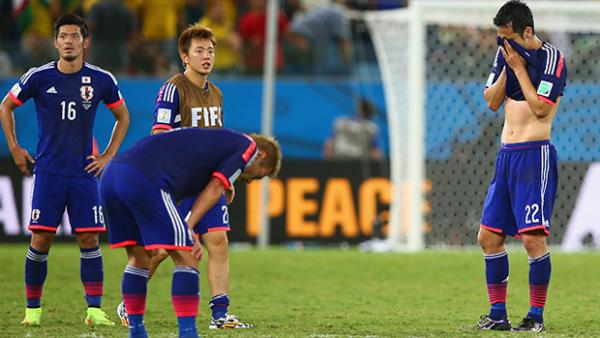 Japanese players look on after their World Cup exit.