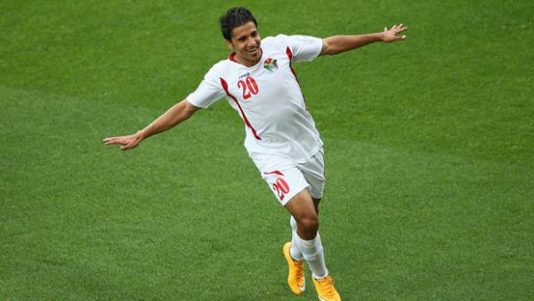 Hamza Al Dardour celebrates a goal against Palestine at January's Asian Cup.